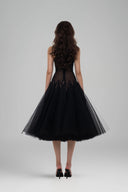 Black Fae Flared Halter Neck Midi Dress for women, from Huelley Rose, The Viet Concept