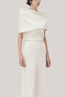 White Anh Vi Straight Asymmetric Sleeved Satin Top for women, from TINH, The Viet Concept 