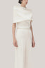 White Anh Vi Straight Asymmetric Sleeved Satin Top for women, from TINH, The Viet Concept 