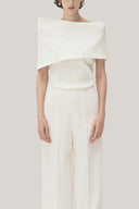 White Anh Vi Straight Asymmetric Sleeved Satin Top for women, from TINH, The Viet Concept 