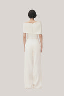 White Anh Vi Straight Asymmetric Sleeved Satin Top for women, from TINH, The Viet Concept 