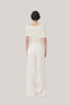 White Anh Vi Straight Asymmetric Sleeved Satin Top for women, from TINH, The Viet Concept 