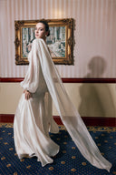 THÉSONG • Ivory Draped Cape Evening Gown