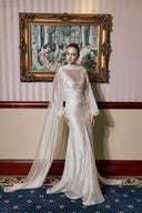 THÉSONG • Ivory Draped Cape Evening Gown