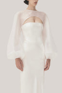 White Anh Vi Straight Asymmetric Sleeved Satin Top for women, from TINH, The Viet Concept 