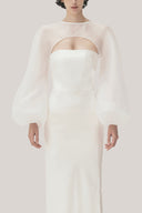 White Anh Vi Straight Asymmetric Sleeved Satin Top for women, from TINH, The Viet Concept 