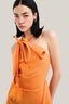 Close on Apricot Asymmetric Halter Midi Dress for women, from MUST HAVE, The Viet Concept1