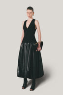 Side of Black Lacey A-line Draped Leather Midi Skirt for women, from LECIA, The Viet Concept